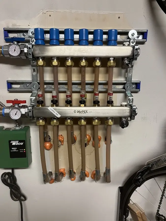 Plumber performing Water Heater Repair at a residential property in La Crosse